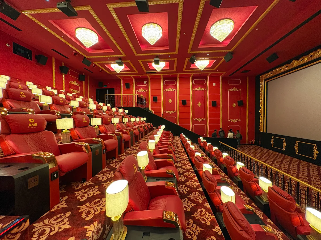 AMB Cinemas premium auditorium with red seating at Kapali Mall