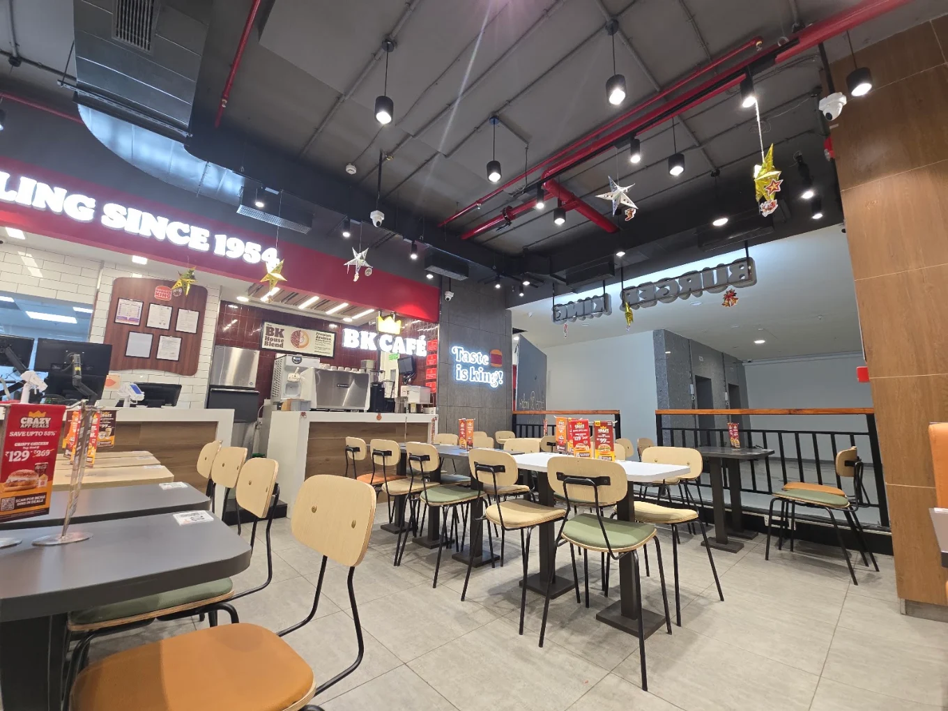 Burger King seating area and counter at Kapali Mall, Bengaluru